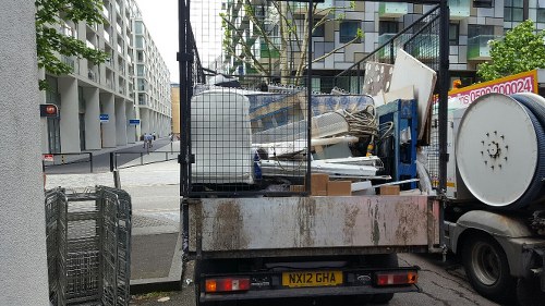Local man and van team unloading furniture
